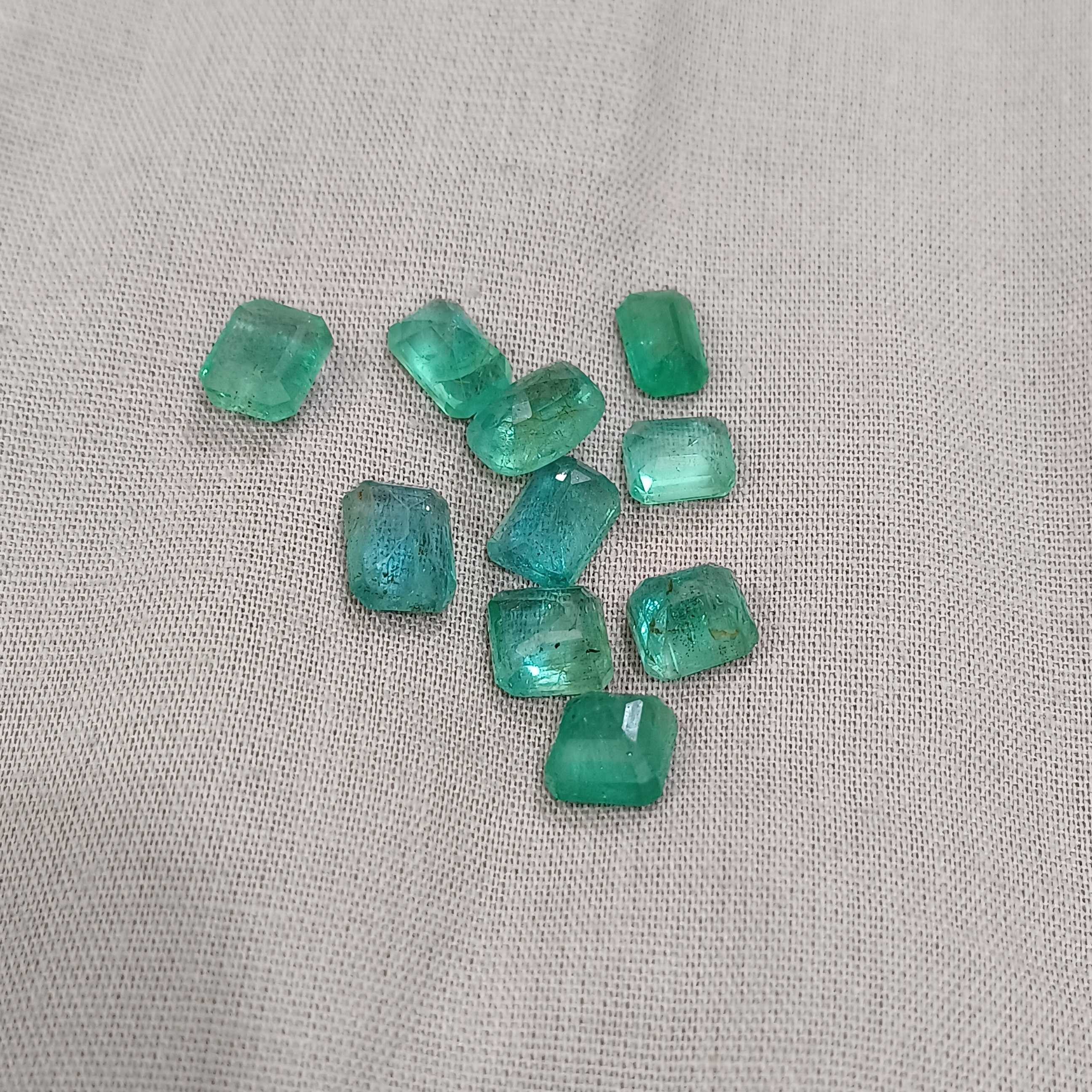 14.72ct golden green octagon cut emerald gem parcel