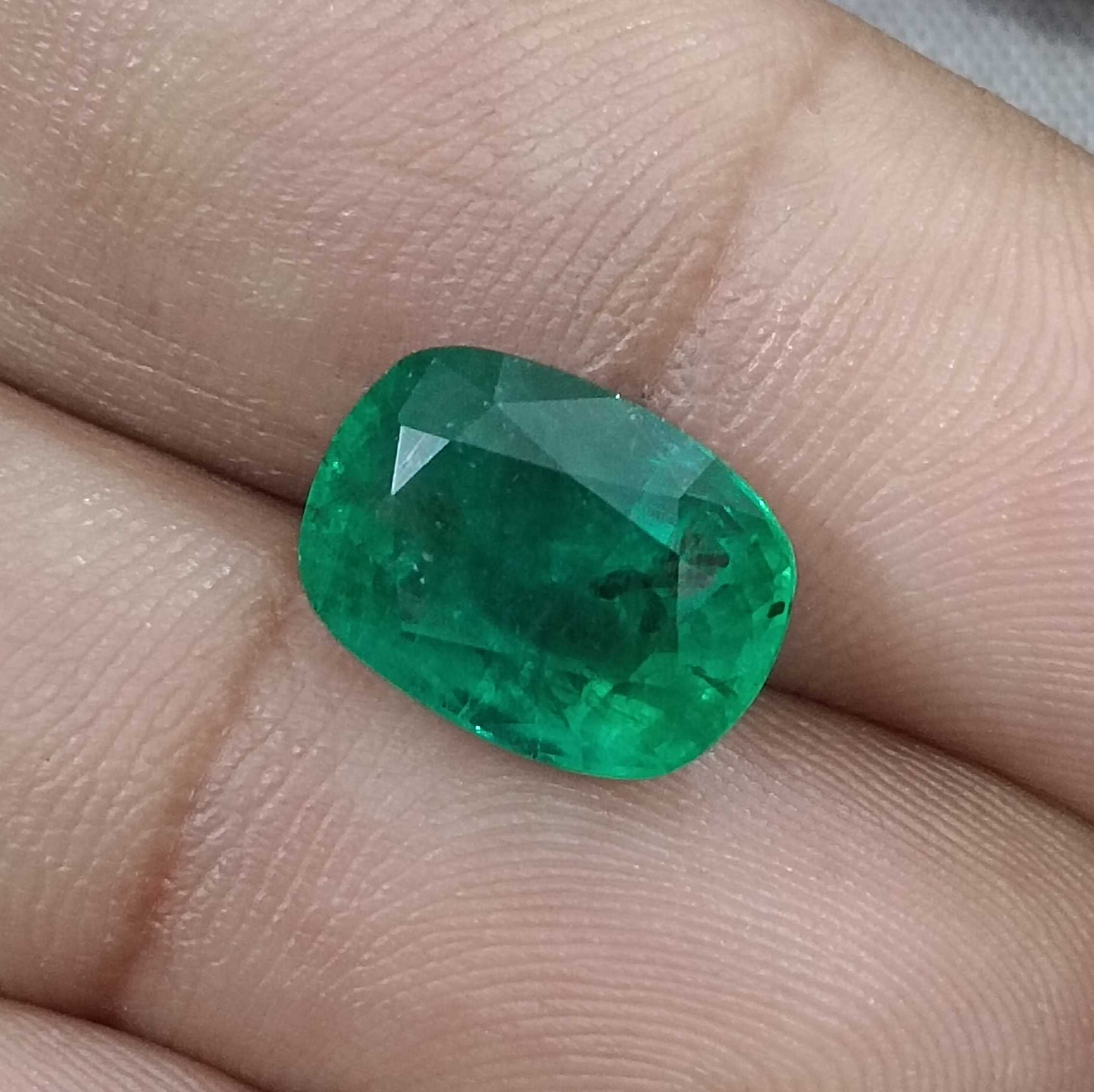 5.49ct GSI certified alpine green cushion shape emerald gemstone